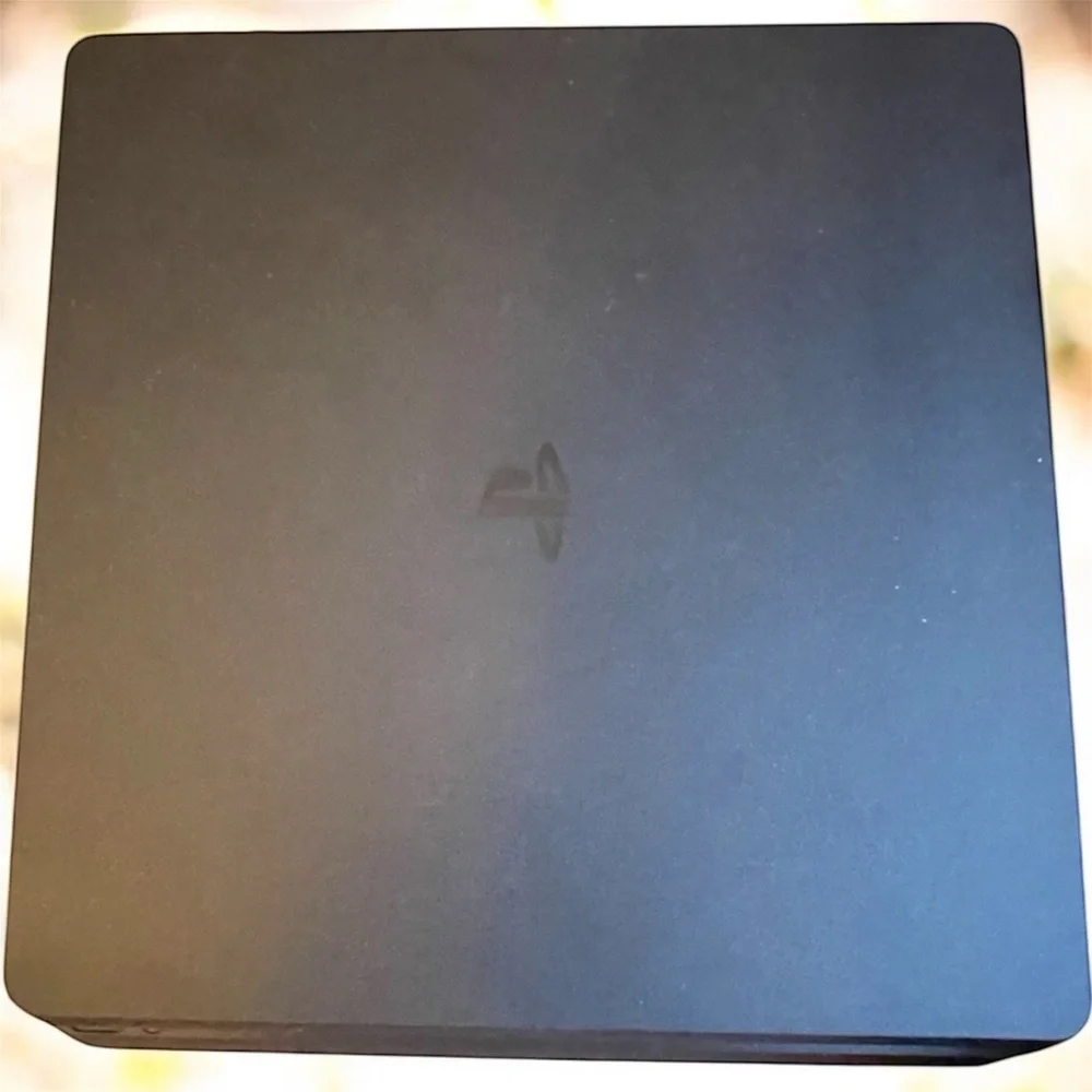 Sony PlayStation PS 4 Slim Console 1TB, 2 controllers, charging dock ONLY